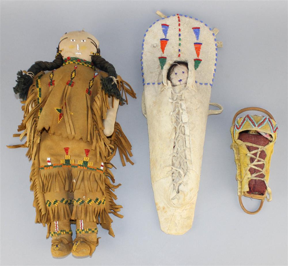 Appraisal: THREE NATIVE AMERICAN BEADED HIDE TOYS Plains first quarter th