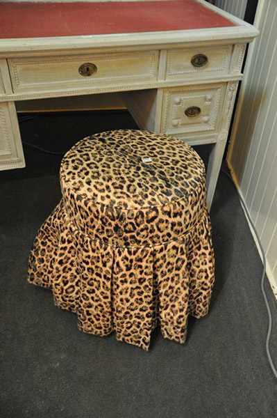 Appraisal: A BEDROOM STOOL WITH LEOPARD PRINT UPHOLSTERY