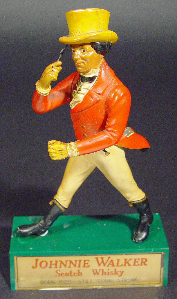 Appraisal: Johnnie Walker Scotch Whisky composite advertising figure on stand cm