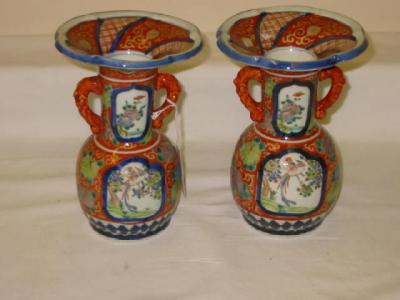 Appraisal: A PAIR OF CHINESE PORCELAIN VASES of bellied form with