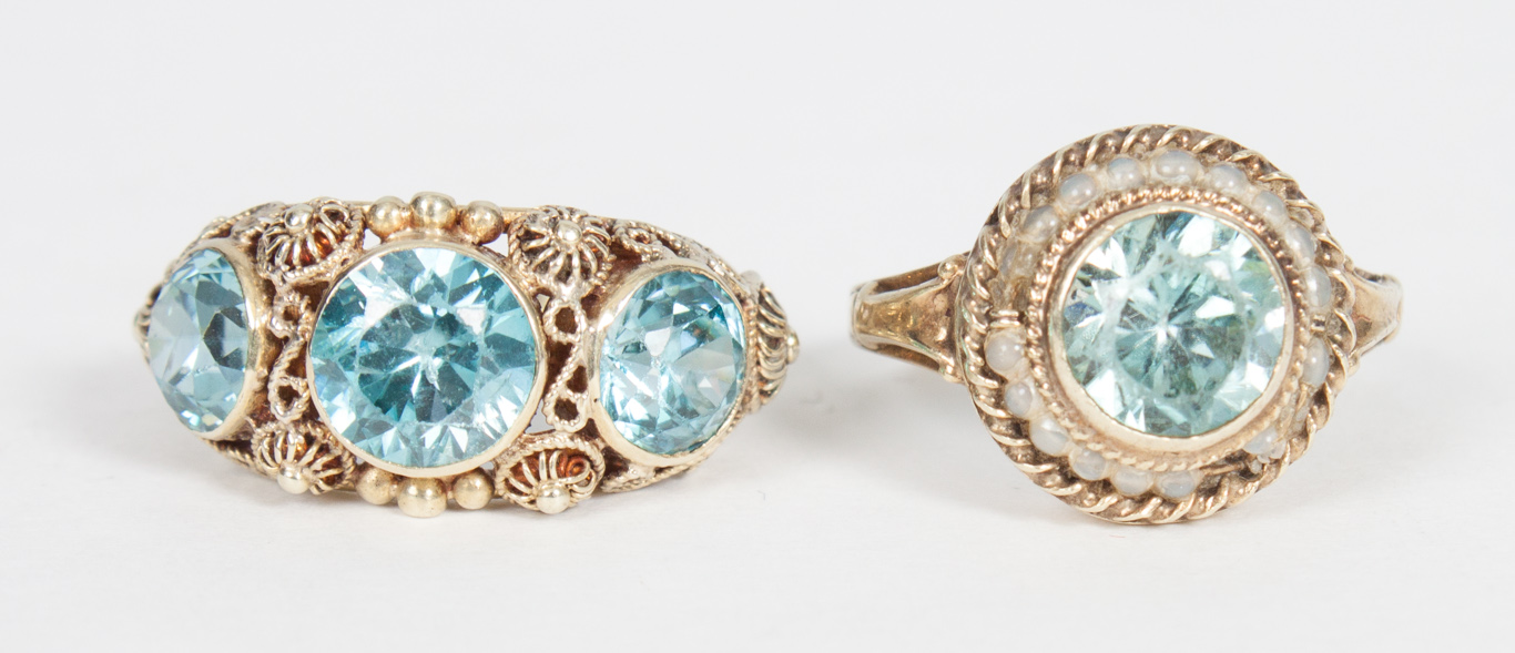 Appraisal: Two gold and blue topaz rings K gold ring with