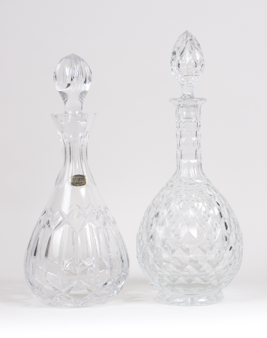 Appraisal: Two crystal decanters Atlantis Cristal Portugal and faceted crystal decanter