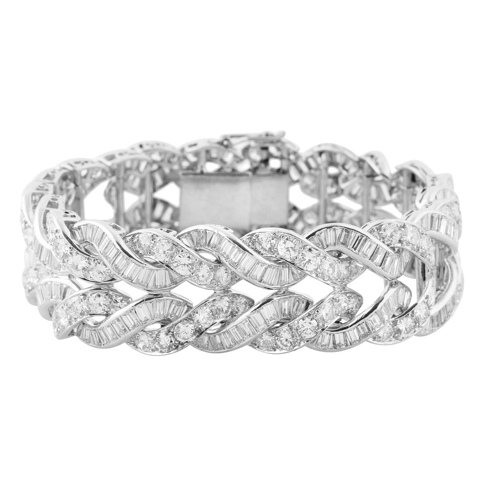 Appraisal: DIAMOND BRAIDED BRACELET DIAMOND BRAIDED BRACELET alternating braided pattern of