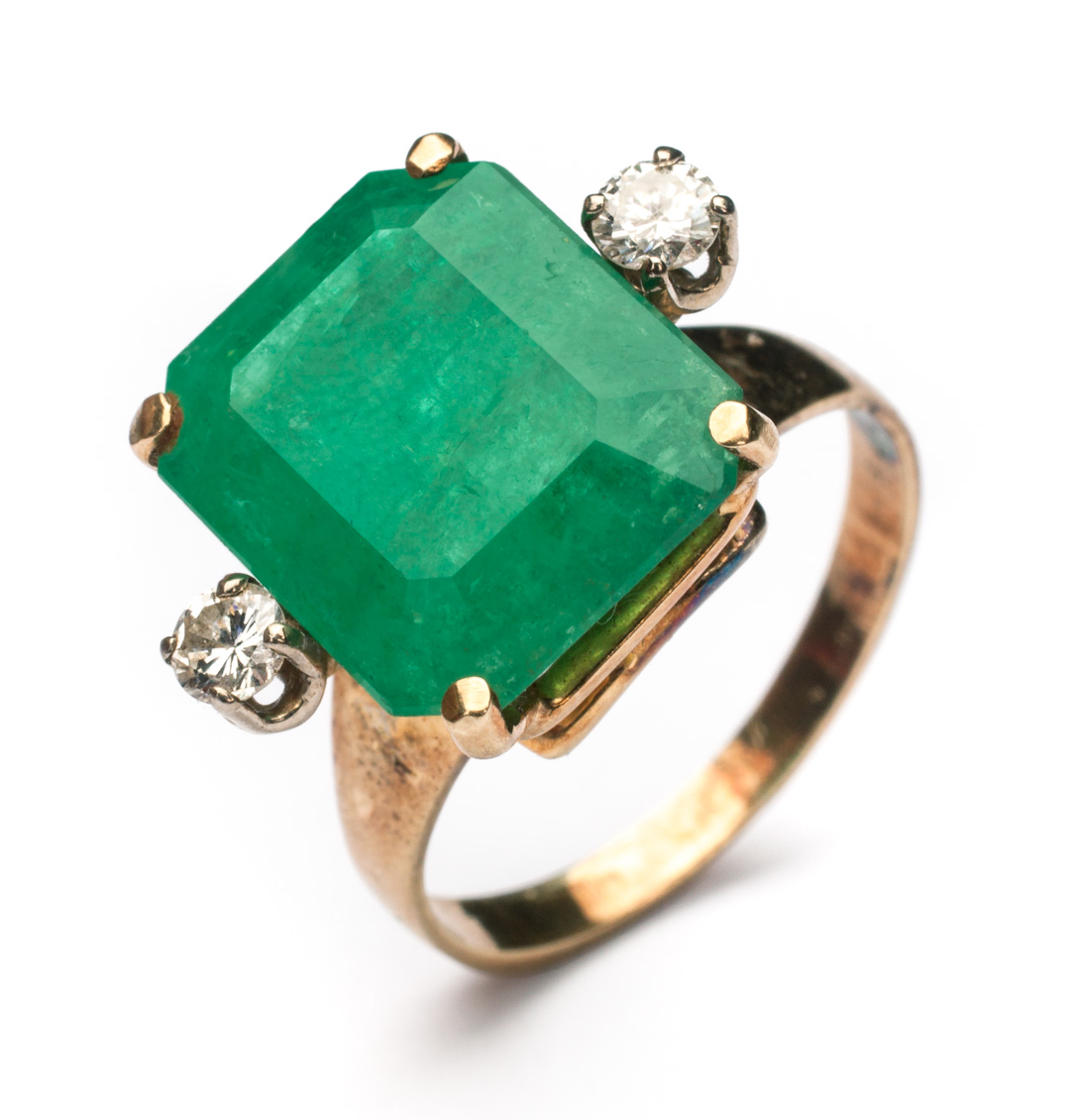 Appraisal: Lady's gold emerald diamond ring step-cut emerald about cts in