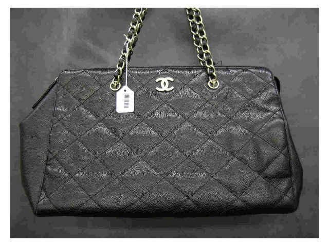 Appraisal: Large Chanel handbag quilted black leather zipper purse with black