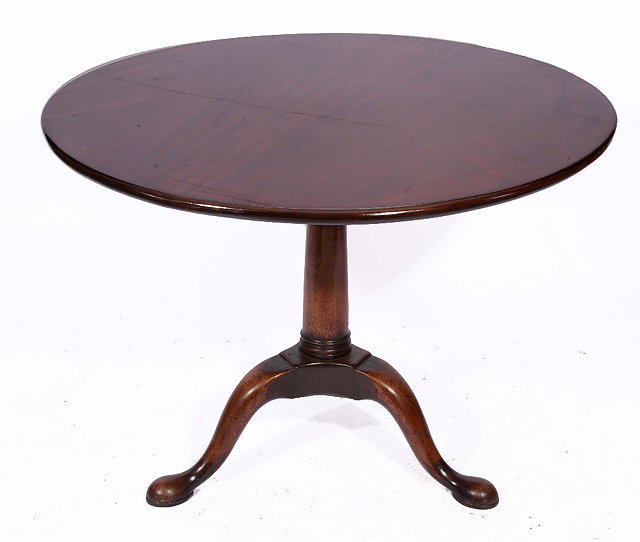 Appraisal: A GEORGE III MAHOGANY TRIPOD TABLE the circular top with