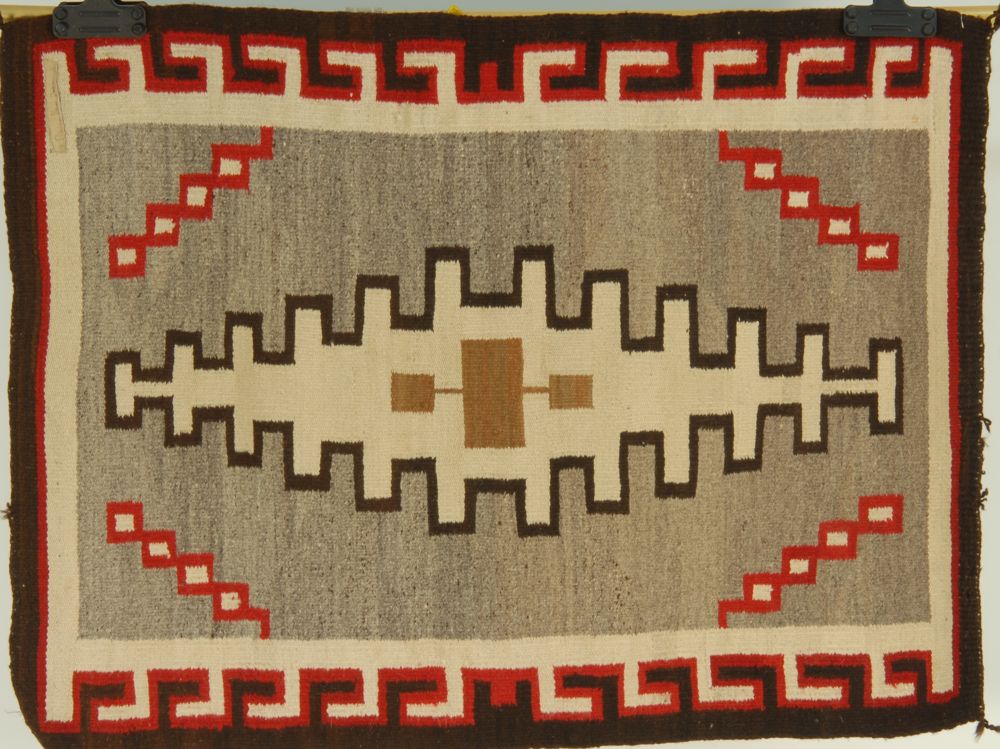 Appraisal: TWO NAVAJO SCATTER RUGS With geometric design One red white