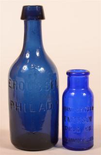 Appraisal: Two Blue Glass Bottles st E Roussel Philadelphia Beer Bottle