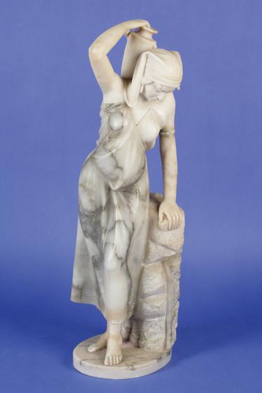 Appraisal: AN ITALIAN WHITE MARBLE AND ALABASTER SCULPTURE of a woman