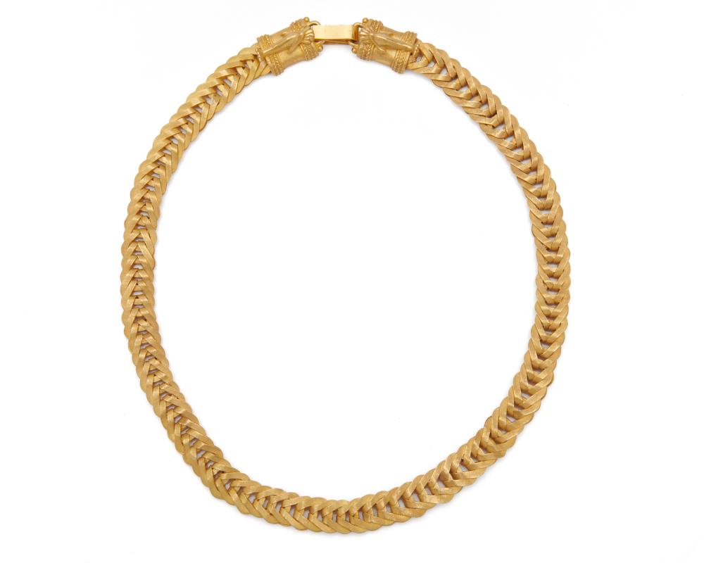 Appraisal: K Gold Necklace Greece comprising flattened wheat-links completed by a