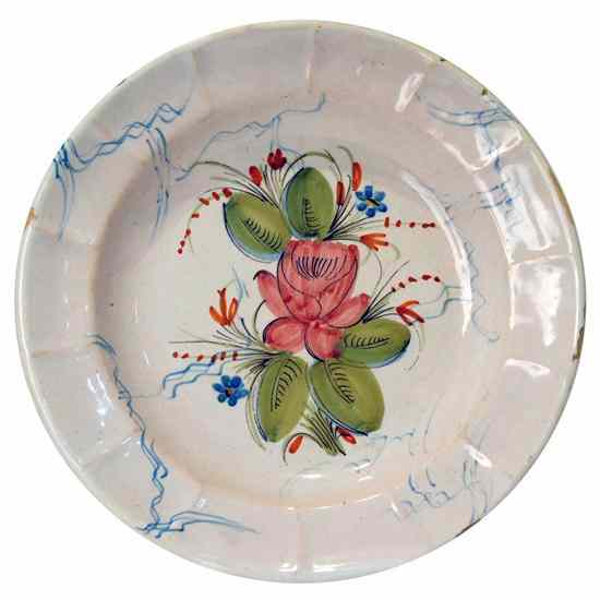 Appraisal: A French Faience Pottery Floral Charger Plate circa a tin-glazed