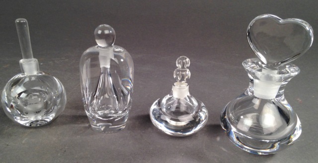 Appraisal: Four Orrefors Perfume Bottles One with large heart shape stopper