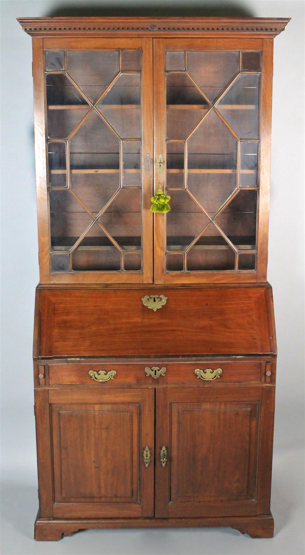 Appraisal: GEORGE III MAHOGANY SECRETARY BOOKCASE WITH FOLIO CABINET in two