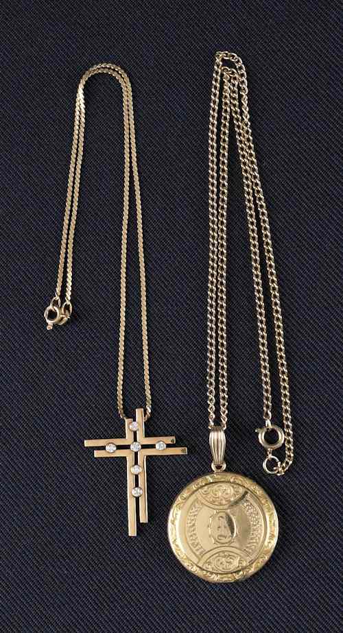 Appraisal: Two K yellow gold necklaces and pendants to include a