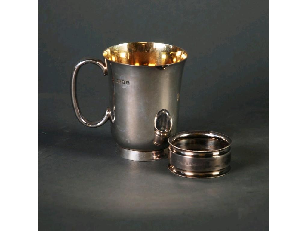 Appraisal: EDWARD VIII SILVER CHRISTENING MUG plain cylindrical form with flared