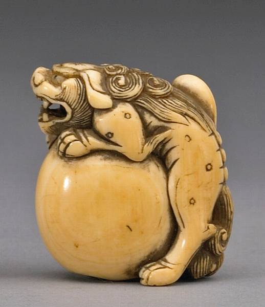 Appraisal: An ivory netsuke of a shishi th Century The humorous