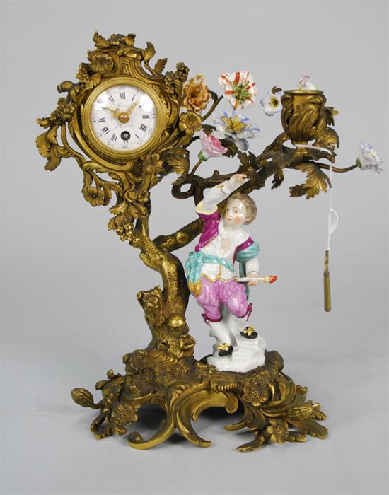 Appraisal: LOUIS XV STYLE GILT BRONZE AND FIGURAL PORCELAIN CLOCK C