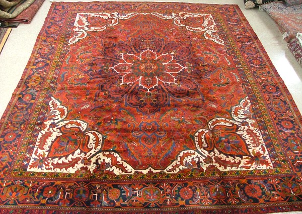 Appraisal: PERSIAN HERIZ CARPET Azarbaijan province eastern Iran centering an extra