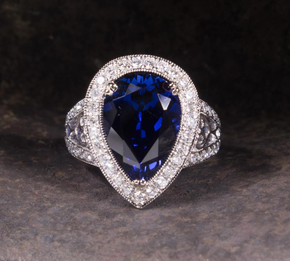 Appraisal: SAPPHIRE DIAMOND AND FOURTEEN KARAT GOLD RING The white gold