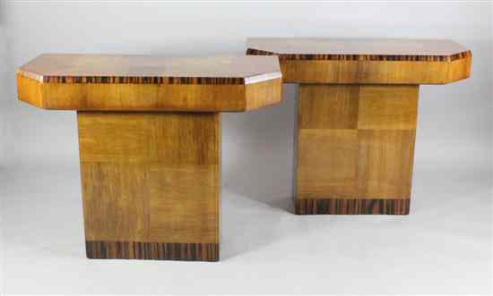 Appraisal: A pair of Art Deco walnut and coromandel wood console