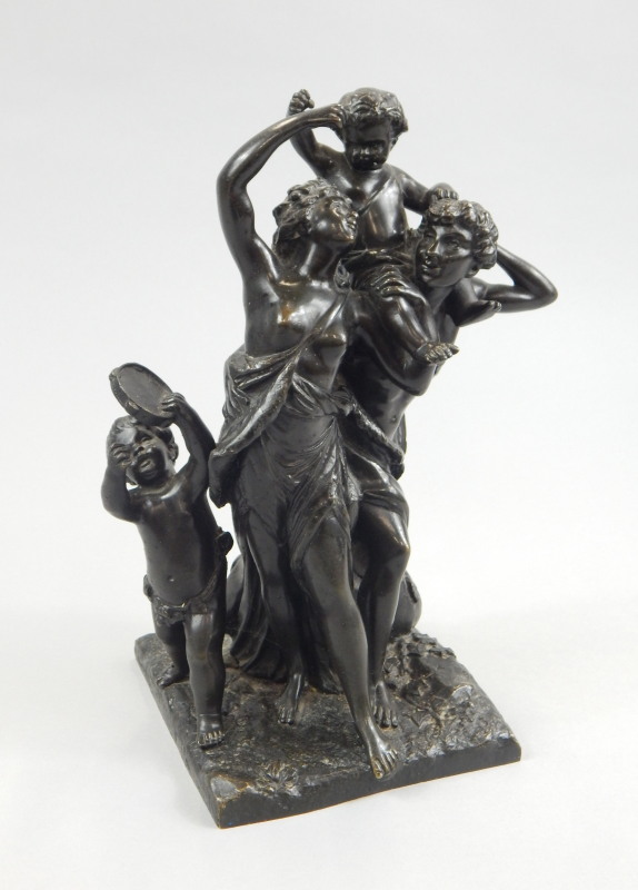 Appraisal: A thC Grand Tour type bronze figure group modelled in