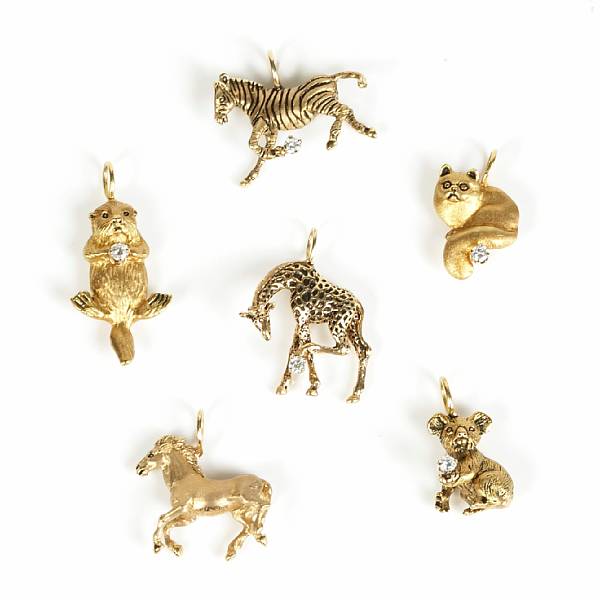 Appraisal: A collection of twelve k and k gold animal charms