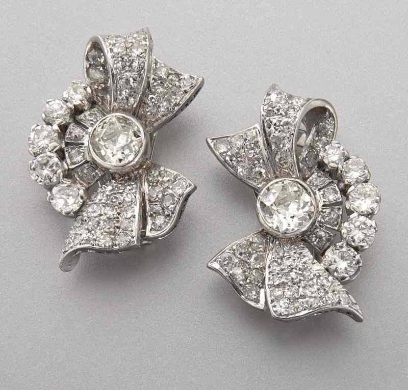 Appraisal: Art Deco platinum and diamond earringsin a bow-tie design featuring