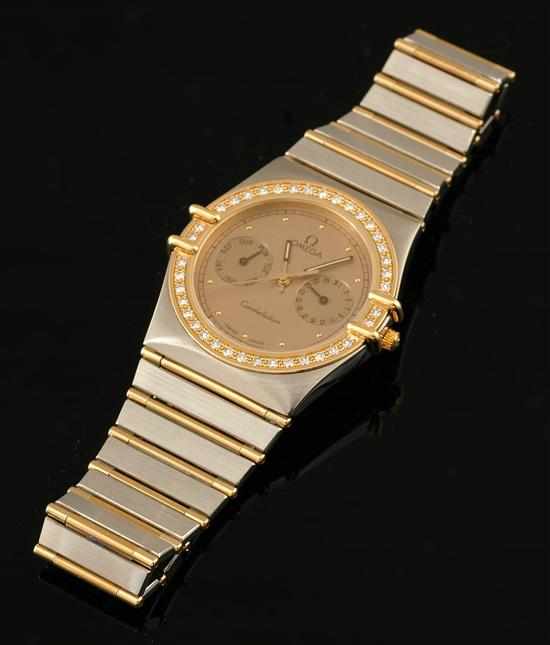 Appraisal: An Omega Constellation diamond wristwatch Quartz movement circular coppered dial