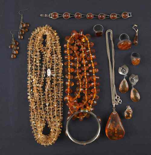 Appraisal: Group of amber jewelry to include a necklace with a