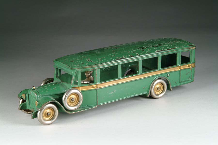 Appraisal: LARGE GREEN BUS W SIDEMOUNTS Manufactured by Arcade Mfg Co