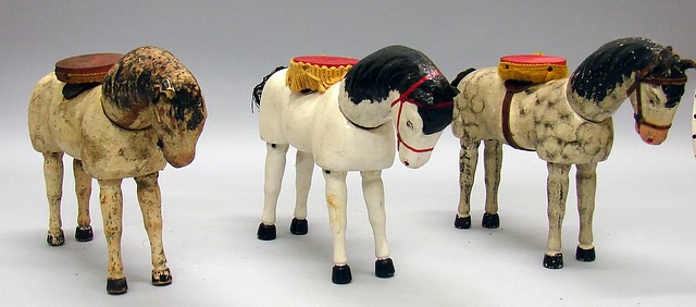 Appraisal: Schoenhut Lot of animals - Platform horses Gray one is