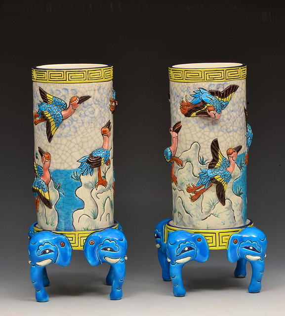 Appraisal: Longwy PotteryPair of vases and stands in the Aesthetic manner