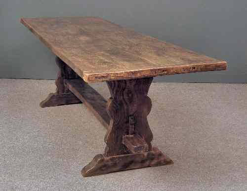 Appraisal: An oak refectory table of th Century design with cleated