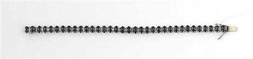 Appraisal: DIAMOND AND SAPPHIRE BRACELET ca White gold g Elegant bracelet