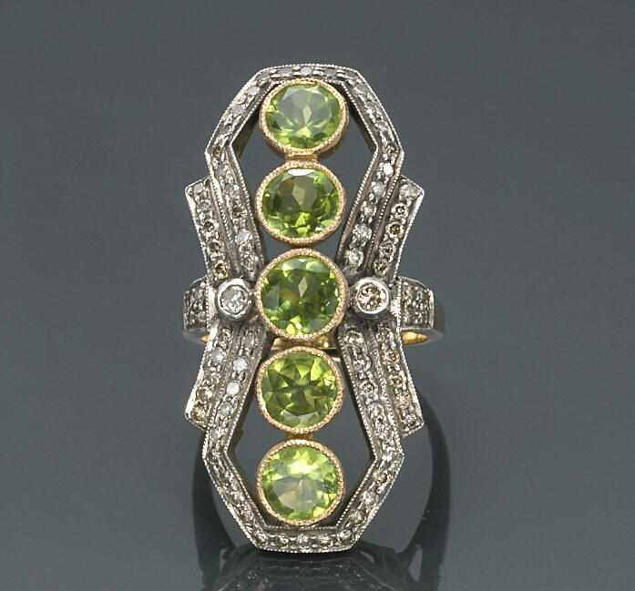 Appraisal: Property of another owner A peridot and diamond ring mounted