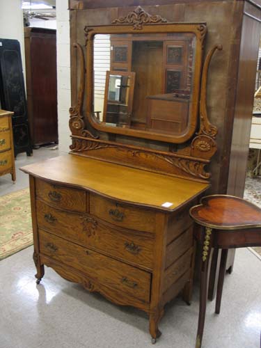 Appraisal: LATE VICTORIAN OAK DRESSER WITH ATTACHED TILT MIRROR American c