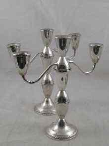 Appraisal: A pair of silver three light candelabra marked '' Ouchin