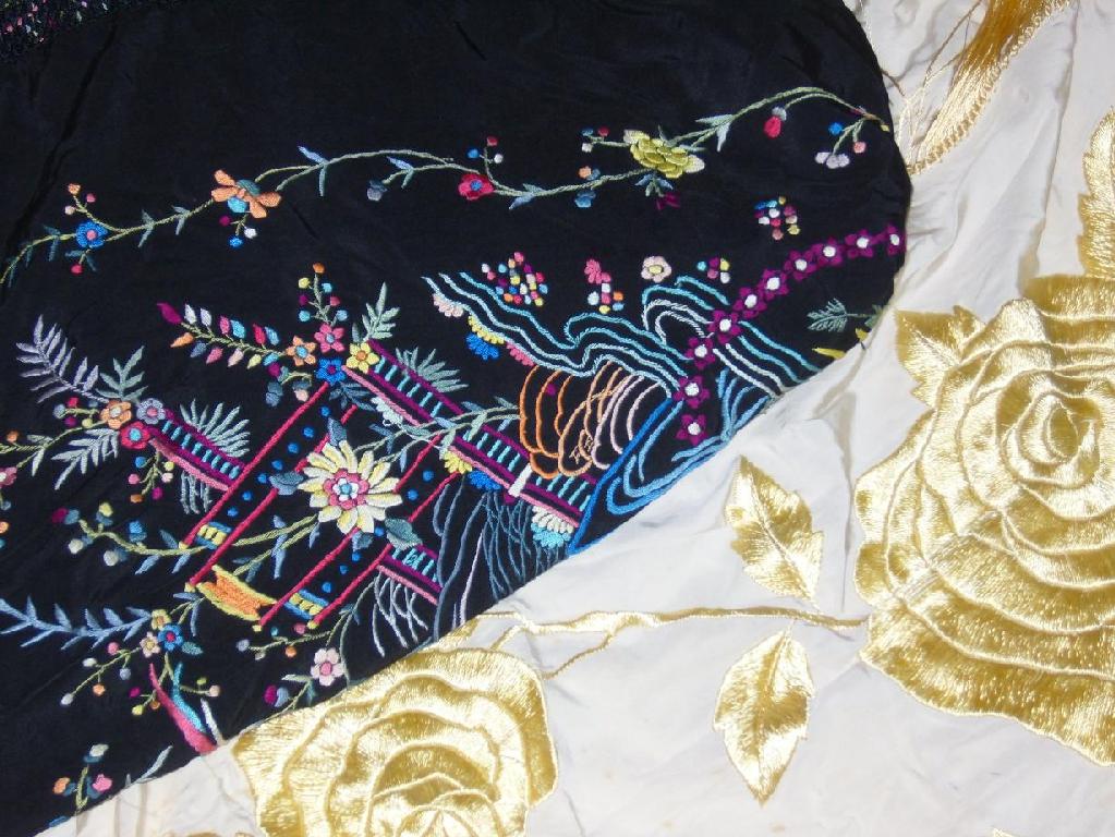 Appraisal: Two embroidered shawls one with Chinoiserie style decoration incorporating pagoda