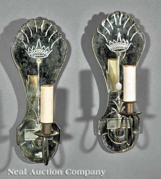 Appraisal: A Pair of Arts Decoratifs Mirrored Sconces each backplate of