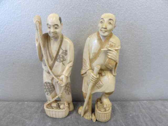 Appraisal: Signed Asian Ivories A man with a cane and pipe