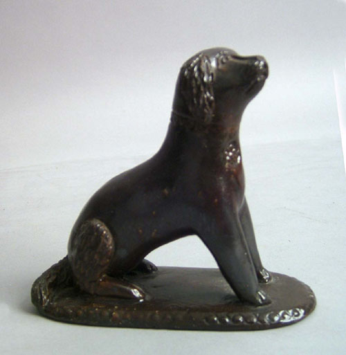 Appraisal: Pennsylvania redware figure of a dog th c h