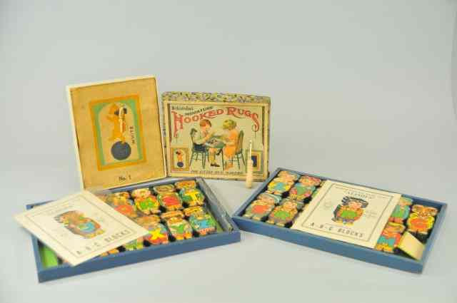 Appraisal: SCHOENHUT ALPHIE'S ABC BLOCKS AND HOOKED RUG SET Includes two