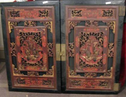 Appraisal: Pair of Carved Chinese Panel Doors With figural inset panels