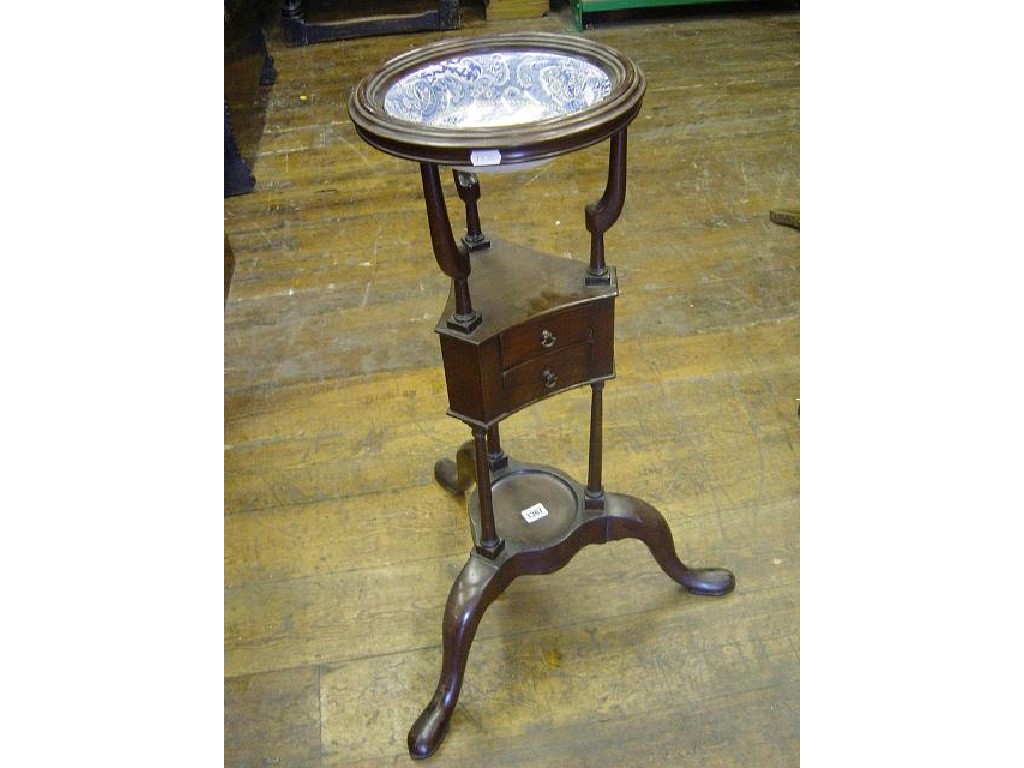 Appraisal: A Georgian mahogany washstand the circular bowl support over small