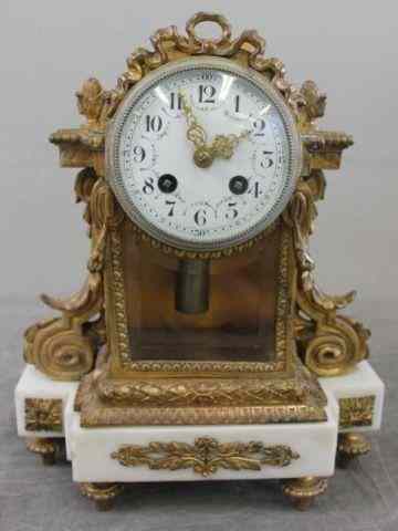 Appraisal: Gilt Metal and Marble Clock From a Garden City NY