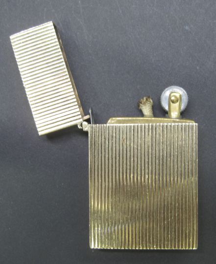 Appraisal: Diminutive French Fourteen-Karat Gold Cigarette Lighter second quarter th century