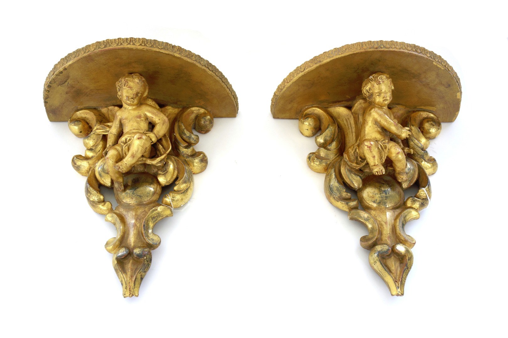 Appraisal: A pair of Louis XV style giltwood wall brackets late