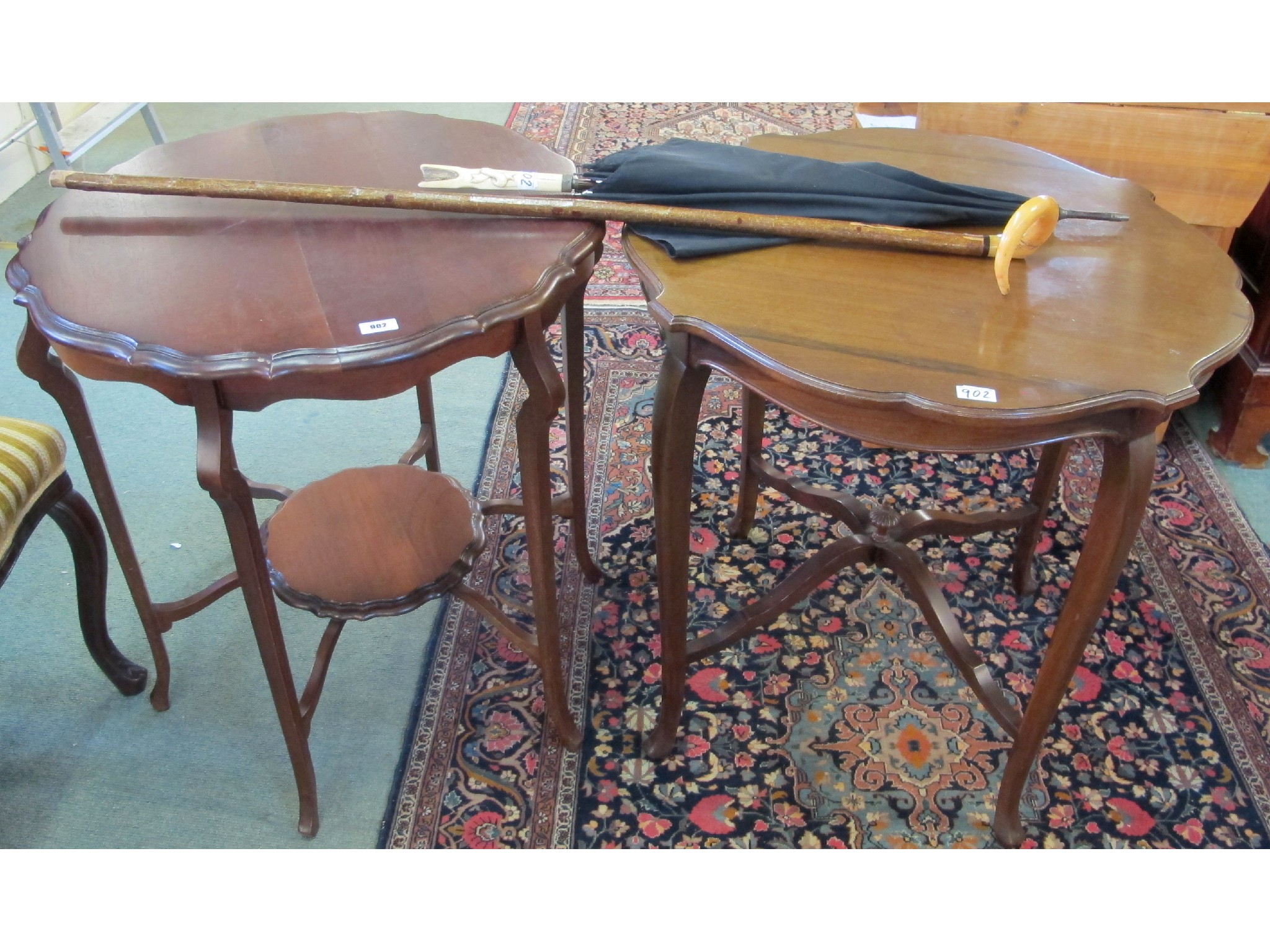 Appraisal: Two occasional tables walking stick and an umbrella