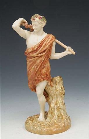 Appraisal: A ROYAL WORCESTER FIGURE of Bacchus carrying a club modelled