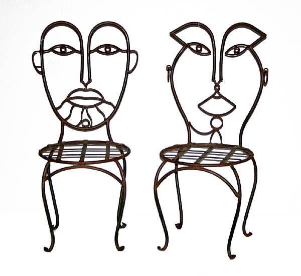 Appraisal: A pair of wrought metal chairs in the manner of